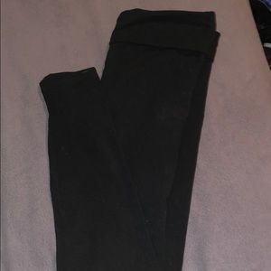 Slightly worn fold over band leggings